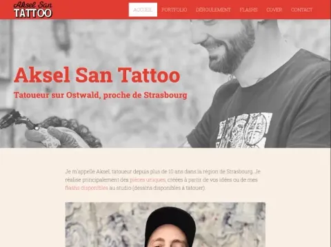 Page d'accueil du site Aksel San Tattoo, avec le portfolio de tatouages en couleur.